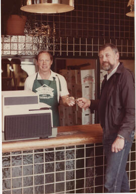 Mitch Taylor, CEO, doing a sales transaction in the Granville Island Brewing retail store in 1984